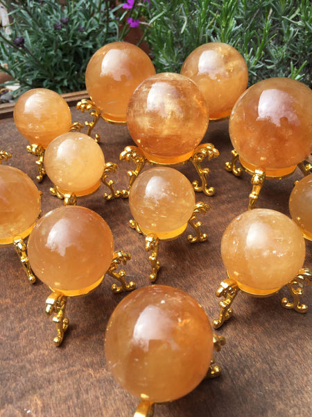 Gold filigree sphere stands